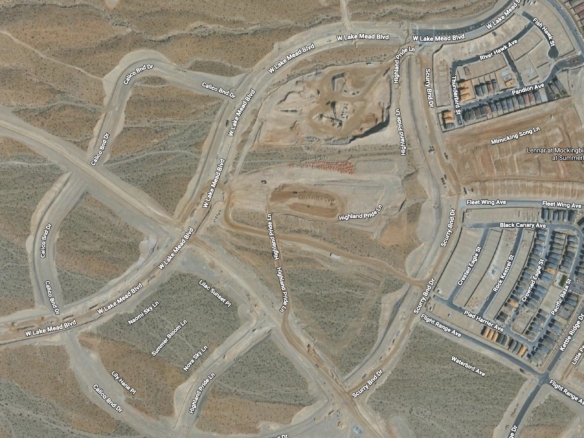 Aerial view of residential land in Summerlin West slated for future home development near West Lake Mead Boulevard, illustrating ongoing expansion within the master-planned community.