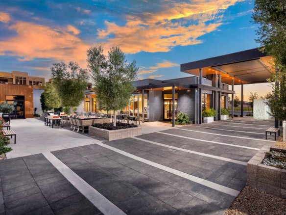 Modern clubhouse and outdoor gathering spaces at Trilogy in Summerlin, a guard-gated 55+ community in Las Vegas, Nevada.